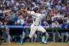 Seattle Mariners' Julio Rodriguez hits a solo home run during the sixth inning of a baseball game against the New York Mets, Tuesday, June 2, 2026, in Seattle. (AP Photo/Stephen Brashear)