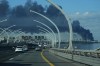 A plume of black smoke is seen over the port of St. Petersburg, Russia, Wednesday, June 3, 2026, after a Ukrainian drone attack. (AP Photo)