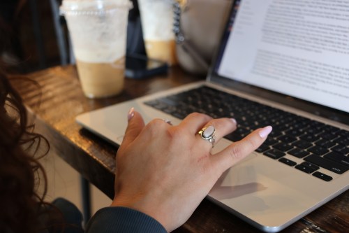 Northern Arizona University student Alexia Ruvalcaba works on her computer at Foxtail Coffee Co. in Flagstaff, Ariz. on Monday, April 20, 2026. (AP Photo/Cheyanne Mumphrey)