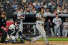 Cleveland Guardians' José Ramírez looks after his solo home run during the sixth inning of a baseball game against the New York Yankees, Wednesday, June 3, 2026, in New York. (AP Photo/Seth Wenig)
