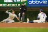Chicago Cubs shortstop Dansby Swanson (7) tags out Athletics' Tyler Soderstrom (21) at second base during the eighth inning in a baseball game Wednesday, June 3, 2026, in Chicago. (AP Photo/David Banks)