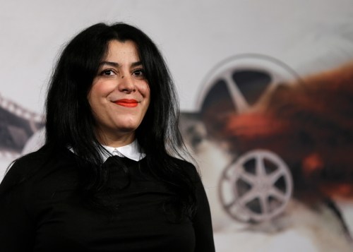 FILE - Director, illustrator and author Marjane Satrapi poses for photographers as she arrives to present the movie 