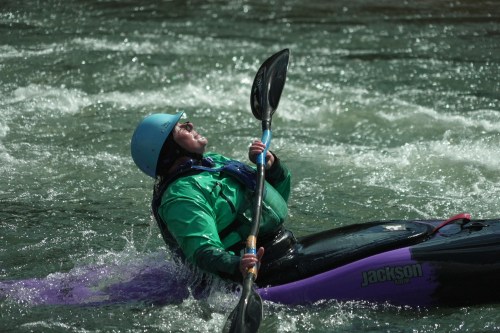Hannah Ray J Childs kayaks at a whitewater park she helped create on the Maquoketa River Thursday, May 7, 2026, in Manchester, Iowa. (AP Photo/Brittany Peterson)