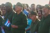 Cuba's President Miguel Diaz-Canel, second left, and Raul Castro's grandson Raul Guillermo Rodriguez Castro, center back, take part in a rally in support of former President Raul Castro in front of the U.S. Embassy in Havana, Cuba, Friday, May 22, 2026, after U.S. prosecutors filed an indictment accusing him of ordering the 1996 shootdown of civilian planes flown by Miami-based exiles. (AP Photo/Ramon Espinosa)