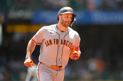 San Francisco Giants' Casey Schmitt runs the bases after hitting a home run during the first inning of a baseball game against the Milwaukee Brewers, Thursday, June 4, 2026, in Milwaukee. (AP Photo/Kayla Wolf)
