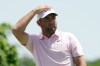 Scottie Scheffler watches his tee shot from the fifth tee during the first round of the Memorial golf tournament in Dublin, Ohio, Thursday, June 4, 2026. (AP Photo/Sue Ogrocki)