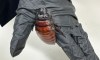 This image supplied by Australia's Department of Climate Change, Energy, the Environment and Water shows, a staff member holding a Madagascar hissing cockroach seized from a commercial breeder at Bathurst, Australia, Tuesday, May 26, 2026. (Department of Climate Change, Energy, the Environment and Water via AP)