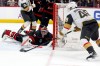Carolina Hurricanes goaltender Frederik Andersen (31) stops a shot byf Vegas Golden Knights' Ivan Barbashev (49) during the third period in Game 2 of the NHL hockey Stanley Cup Final series in Raleigh, N.C., Thursday, June 4, 2026. (AP Photo/Karl DeBlaker)