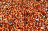 FILE - Dutch fans celebrate in preparation for the first match of their team at the special Dutch fan party area in Leipzig, eastern Germany, June 11, 2006. (AP Photo/Eckehard Schulz, File)