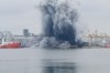 In this photo taken from video provided by OBSERVATOR ANTENA 1, an explosion of sea drone is seen in Constanta port, Romania, Friday, June 5, 2026. (OBSERVATOR ANTENA 1 via AP)