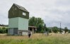 French police guard a farm silo where a body was found yesterday during the search to find missing 11 year-old girl Lyhanna in Puycasquier, southwestern France, Friday, June,5, 2026. (AP Photo/Frederic Lancelot)