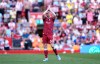 Liverpool's Andrew Robertson applauds the fans on his final appearance during the Premier League match between Liverpool and Brentford, in Liverpool, England, Sunday May 24, 2026. (Peter Byrne/PA via AP)