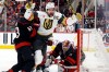Vegas Golden Knights' Mark Stone (61) celebrates after his goal while in the grasp of Carolina Hurricanes' Jackson Blake (53) with Hurricanes goaltender Frederik Andersen, right, nearby during the third period in Game 2 of the NHL hockey Stanley Cup Final series in Raleigh, N.C., Thursday, June 4, 2026. (AP Photo/Karl DeBlaker)