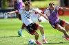 Germany's Lennart Karl, left, and David Raum attend a training session in Herzogenaurach, Germany, Thursday May 28, 2026, ahead of the World Cup tournament. (Federico Gambarini/dpa via AP)