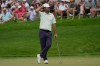 Scottie Scheffler pauses on the 14th green during the second round of the Memorial golf tournament in Dublin, Ohio, Friday, June 5, 2026. (AP Photo/Sue Ogrocki)