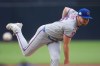 New York Mets starting pitcher Christian Scott works against a San Diego Padres batter during the first inning of a baseball game Friday, June 5, 2026, in San Diego. (AP Photo/Gregory Bull)