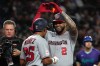 Washington Nationals' Luis García Jr. (2) celebrates with Nasim Nuñez, center left, after hitting a grand slam against the Arizona Diamondbacks in the sixth inning of a baseball game, Friday, June 5, 2026, in Phoenix. (AP Photo/Rick Scuteri)