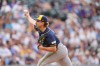 Milwaukee Brewers starting pitcher Brandon Sproat works against the Colorado Rockies in the first inning of a baseball game Friday, June 5, 2026, in Denver. (AP Photo/David Zalubowski)