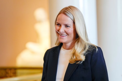 FILE - Norway's Crown Princess Mette Marit smiles during a reception for Norwegian athletes who competed in the Milan Cortina Paralympics, in Oslo, Friday, April 10, 2026. (Lise Åserud/NTB Scanpix via AP, File)