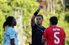 Referee Luca Zufferli shows red cards to Portugal's Rafael Leao, left, and Chile's Ivan Roman during an international friendly soccer match between Portugal and Chile in Oeiras, outside Lisbon, Saturday, June 6, 2026. (AP Photo/Armando Franca)