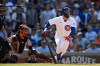 Chicago Cubs' Michael Busch watches his game-winning RBI single to defeat the San Francisco Giants in the 10th inning of a baseball game in Chicago, Saturday, June 6, 2026. (AP Photo/Paul Beaty)