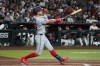 Washington Nationals' Curtis Mead hits a two-run home run against the Arizona Diamondbacks in the first inning of a baseball game, Saturday, June 6, 2026, in Phoenix. (AP Photo/Rick Scuteri)