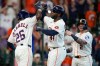 Houston Astros designated hitter Yordan Alvarez, center, celebrates after his grand slam against the Athletics with Taylor Trammell (26) during the second inning of a baseball game, Saturday, June 6, 2026, in Houston. (AP Photo/Eric Christian Smith)
