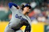 FILE - Los Angeles Dodgers starting pitcher Tyler Glasnow throws during the first inning of a baseball game against the Houston Astros in Houston, Wednesday, May 6, 2026. (AP Photo/Ashley Landis,File)