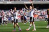 Germany defender Nico Schlotterbeck, right, waves to fans as he leaves the field with forward Kai Havertz after Germany defeated the United States in an international friendly soccer match in Chicago, Saturday, June 6, 2026. (AP Photo/Nam Y. Huh)