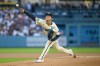 Los Angeles Dodgers starting pitcher Yoshinobu Yamamoto delivers during the first inning of a baseball game against the Los Angeles Angels in Los Angeles, Saturday, June 6, 2026. (AP Photo/Kyusung Gong)