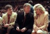 FILE - Actor Elliott Gould, left, joins Donald Trump, center, and Marla Maples at courtside during an NBA basketball game between the Phoenix Suns and the New York Knicks at Madison Square Garden, in New York, March 6, 1991. (AP Photo/Steve Freeman, File)