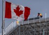 Workers assemble temporary seating high in the air for the FIFA World Cup at BMO field in Toronto on Thursday March 12, 2026. THE CANADIAN PRESS/Frank Gunn