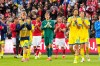 Denmark's and Ukraine's players walk on the pitch after the international friendly soccer match between Denmark and Ukraine was cancelled in Odense, Denmark, Sunday, June 7, 2026, after Christian Eriksen has collapsed on the field again while playing for Denmark’s national team. (Bo Amstrup/Ritzau Scanpix via AP)