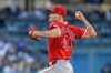 Los Angeles Angels starting pitcher Jack Kochanowicz delivers during the first inning of a baseball game against the Los Angeles Dodgers in Los Angeles, Saturday, June 6, 2026. (AP Photo/Kyusung Gong)