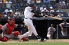 New York Yankees' Cody Bellinger, right, hits a home run during the eighth inning of a baseball game against the Boston Red Sox, Sunday, June 7, 2026, in New York. (AP Photo/Pamela Smith)