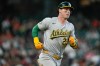 Athletics designated hitter Brent Rooker rounds the bases after hitting a solo home run against the Houston Astros during the fifth inning of a baseball game, Sunday, June 7, 2026, in Houston. (AP Photo/Eric Christian Smith)