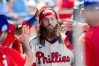 Philadelphia Phillies' Brandon Marsh is cheered in the dugout after hitting a solo home run in the third inning of a baseball game against the Chicago White Sox, Sunday, June 7, 2026, in Philadelphia. (AP Photo/Laurence Kesterson)