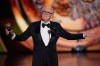 John Lithgow accepts the award for best performance by a leading actor in a play for 