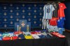Toronto Police say they've arrested two people and seized more than 16,000 counterfeit sports merchandise items ahead of the FIFA World Cup, as they urge the public to only buy from trusted sellers and report suspected fraud. A small portion of the items seized is shown in this handout photo released by Toronto Police on Monday, June 1, 2026. THE CANADIAN PRESS/Handout - Toronto Police Service (Mandatory Credit)