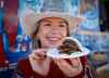 Calgary Stampede Princess Sarah O'Brien holds a 