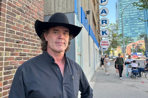 Country singer Corb Lund, who is petitioning the Alberta government to stop new coal mining in the Rocky Mountains, poses for a photo in Edmonton, on Thursday, May 28, 2026. THE CANADIAN PRESS/Lisa Johnson