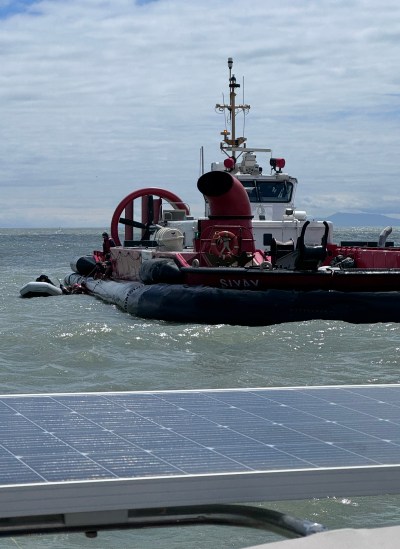 A Coast Guard hovercraft engaged in a marine rescue in the waters off Richmond, B.C., on June 28, 2026, after an unknown vessel capsized with several people aboard who were not wearing life jackets. Married couple Dorothy Stauffer and Brian Angus, seasoned boaters, saw five people in the water, but two people were too far away to rescue. Four people in total were pulled out, while six people remain unaccounted for as the search was called off that night. THE CANADIAN PRESS/Handout-Dorothy Stauffer
(Mandatory Credit)