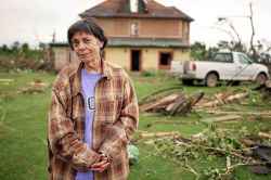 Bernadine and Brian were in shock Monday while they assessed the damage to their house, outbuildings and property.