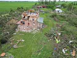The devastation to the home and property belonging to Brian and Bernadine Brown south of Rossburn, Manitoba is visible on Monday after a powerful tornado hit the property on Sunday evening while Brian and Bernadine were inside. Their home, several other buildings on the property, vehicles and hundreds of trees were all heavily damaged by the tornado, but luckily escaped uninjured. 
(Tim Smith/The Brandon Sun)
