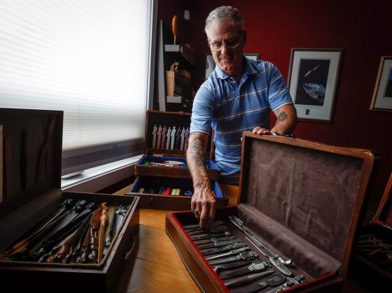 Steve Judge with some of his letter openers. (John Woods / Free Press)