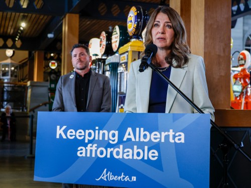 Alberta Premier Danielle Smith, right, announces a new affordability measure in Calgary, on Wednesday, June 17, 2026. THE CANADIAN PRESS/Jeff McIntosh