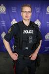 Const. Gary Sheane with the Brandon Police Service wears a body-worn video camera at BPS headquarters on Monday. (Tim Smith/The Brandon Sun)