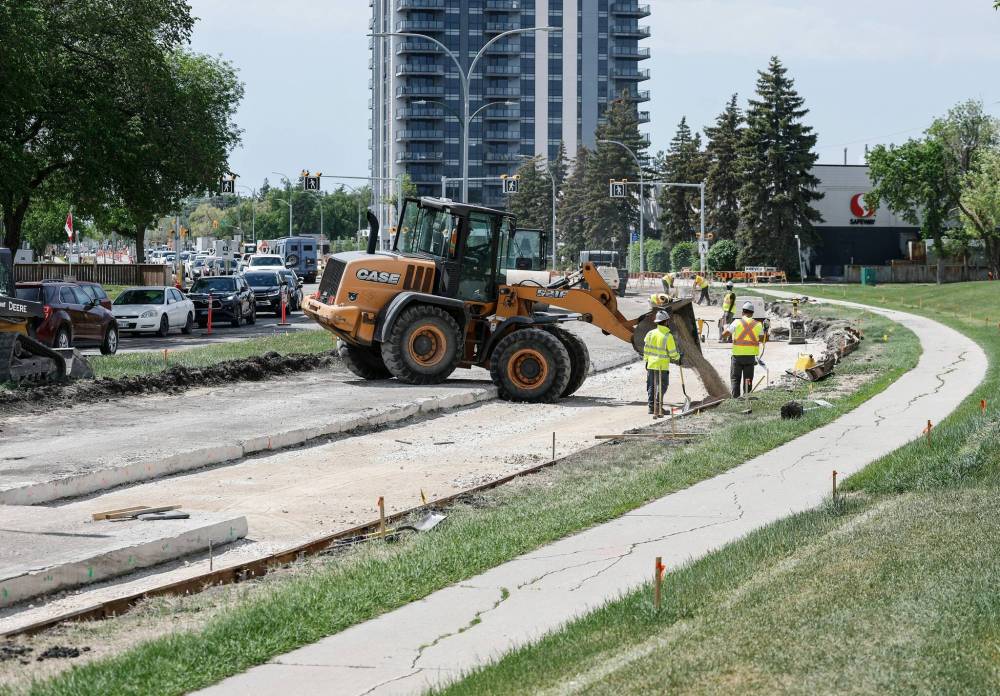 JOHN WOODS / FREE PRESS
                                The $7.5 million in road work on Corydon Avenue between Kenaston and Shaftesbury boulevards is expected to be completed by late fall.