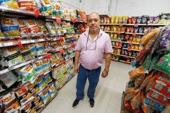 MIKE DEAL / FREE PRESS
                                Munther Zeid, Food Fare co-owner, says he is still waiting to get proper identification of the products he sells that will be PST free starting July 1.