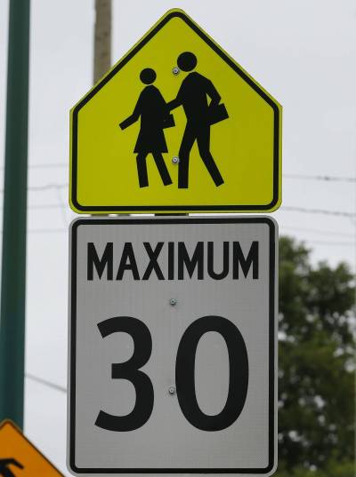 File 
                                A Winnipeg school zone sign